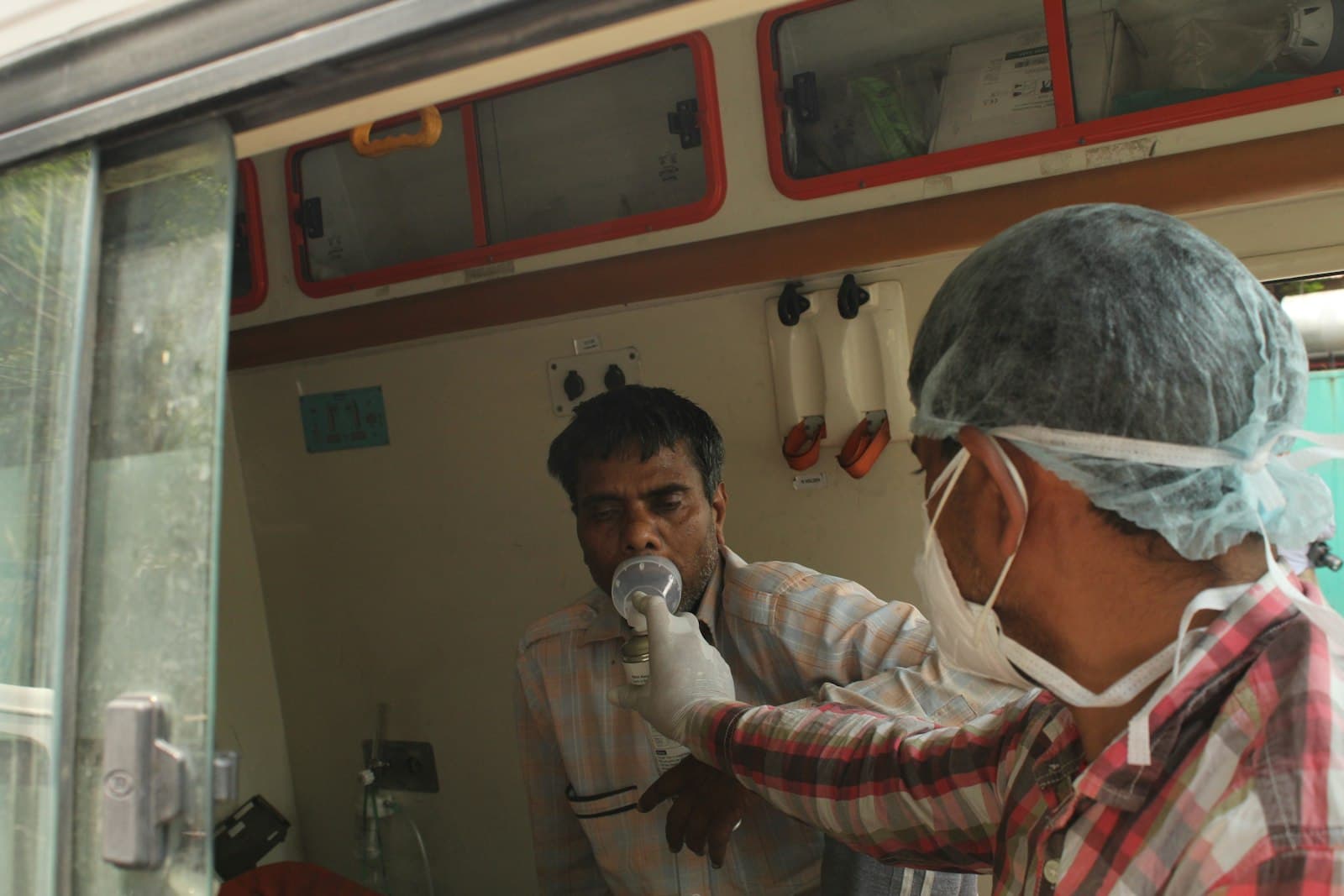 A patient in a hospital bed preparing to go home